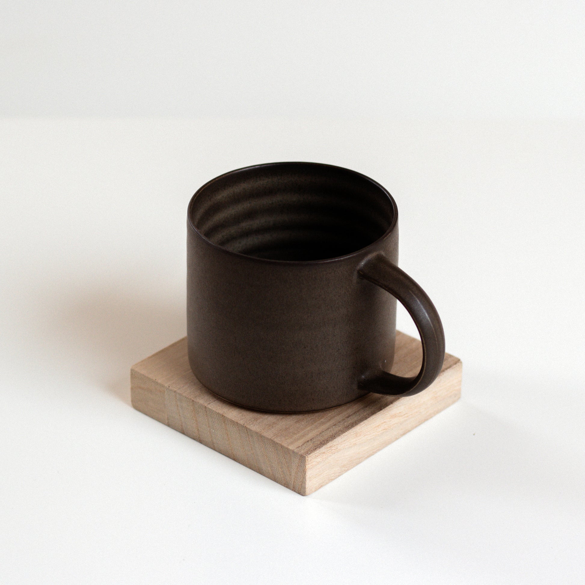 Vinh Truong | Mug | Umber Brown